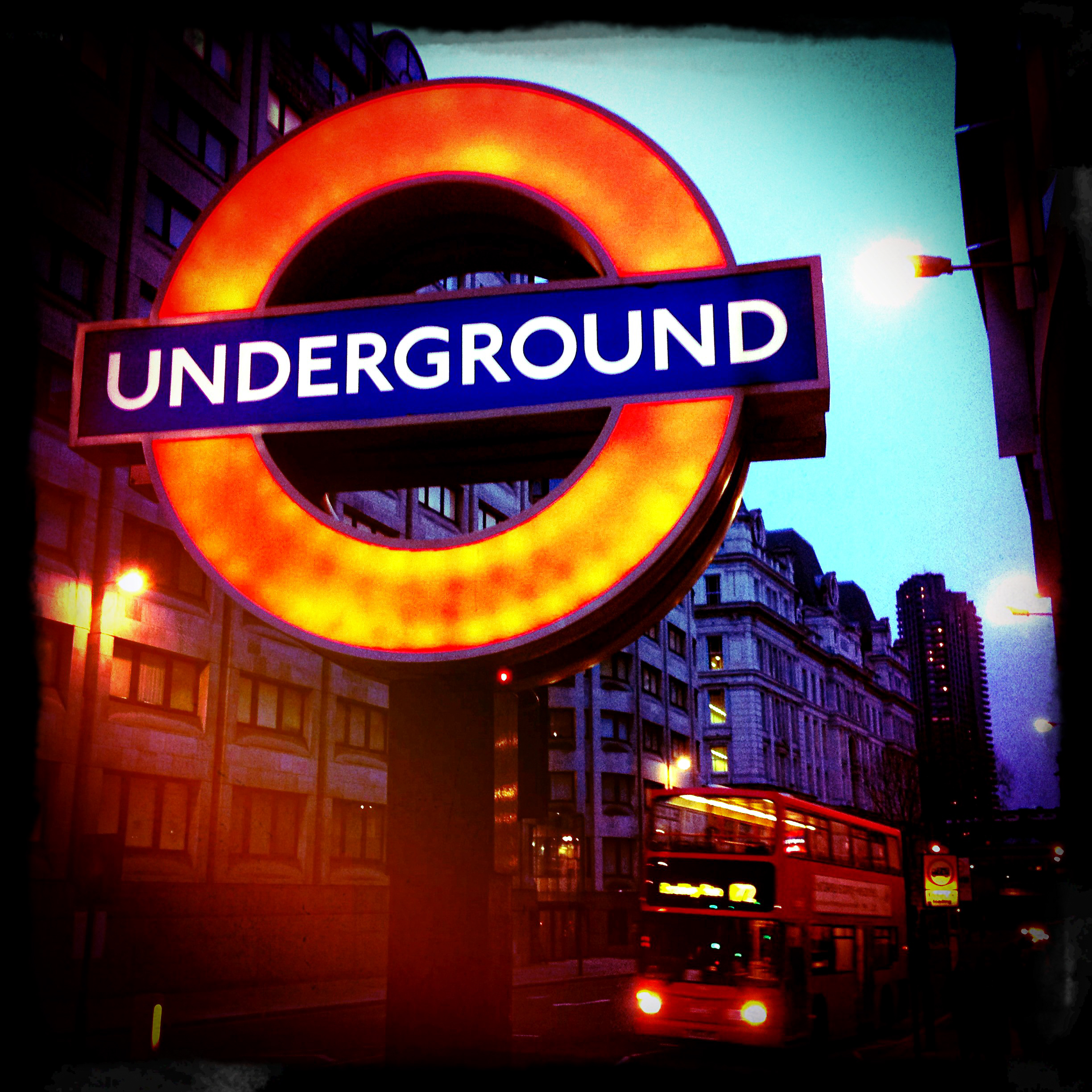 London Underground sign dusk orange blue