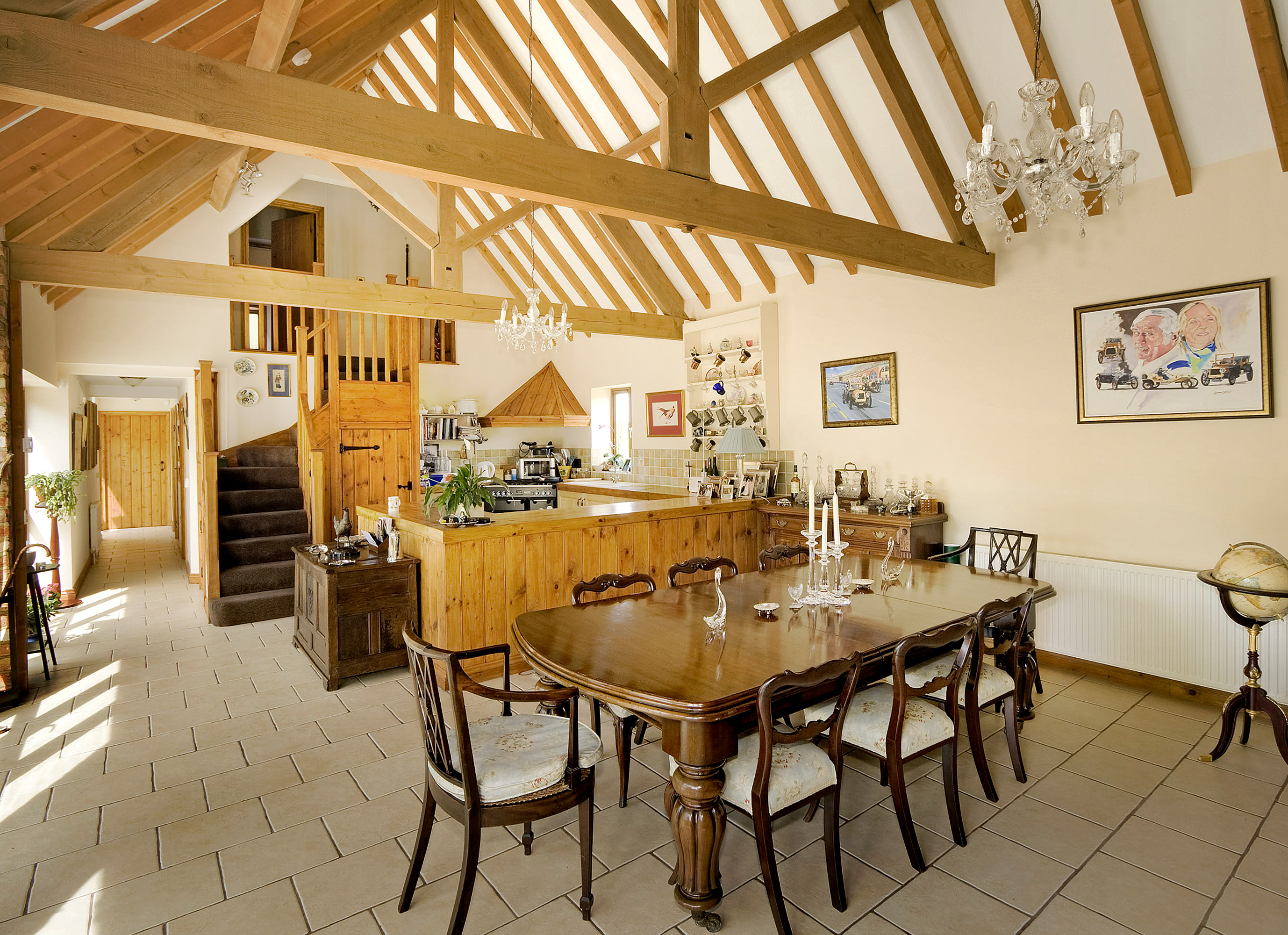 Interior dining room photography showcasing high ceilings and beams for estate agent listing