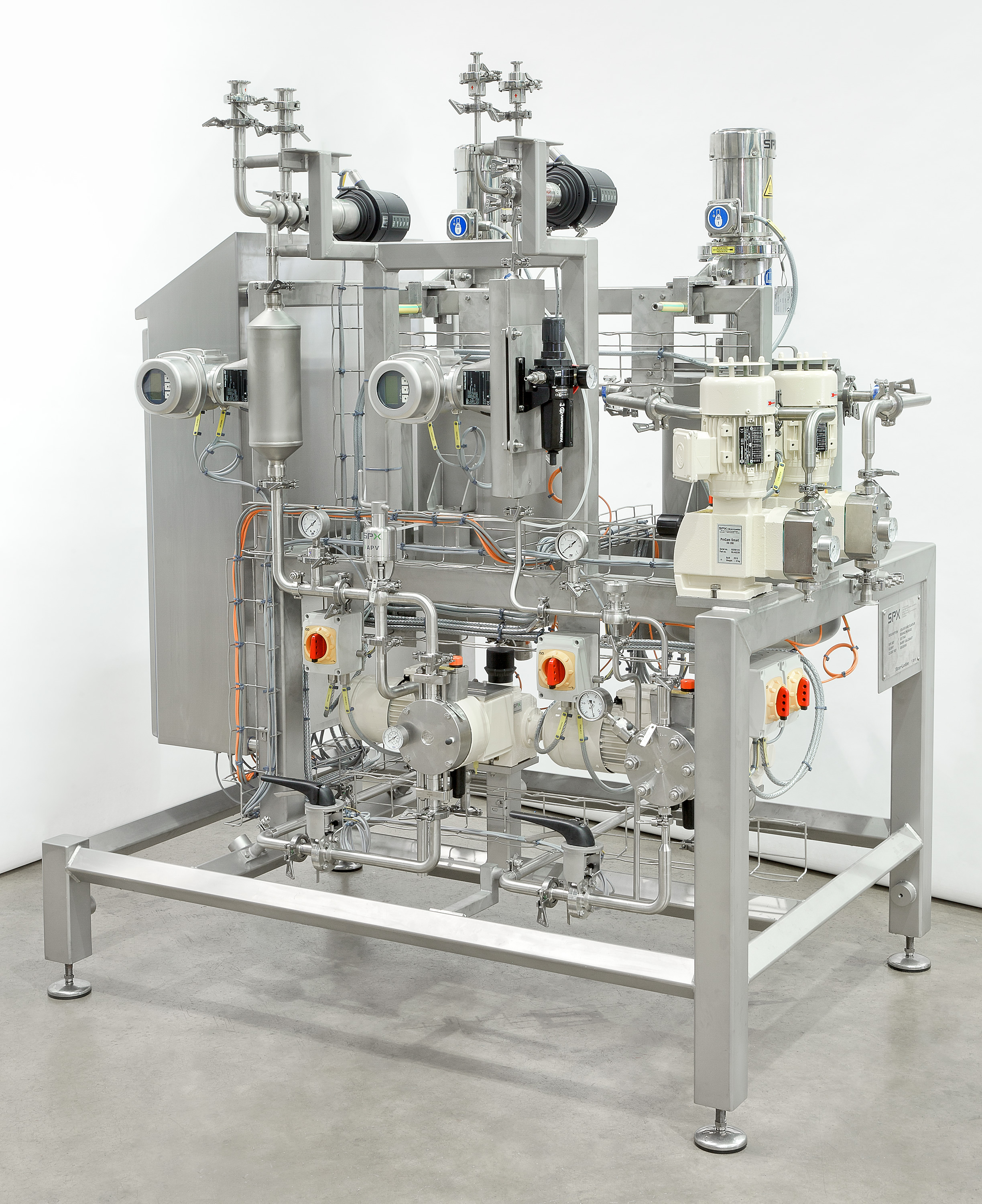 Industrial machinery photo including small pump package, used for food, oil and gas production