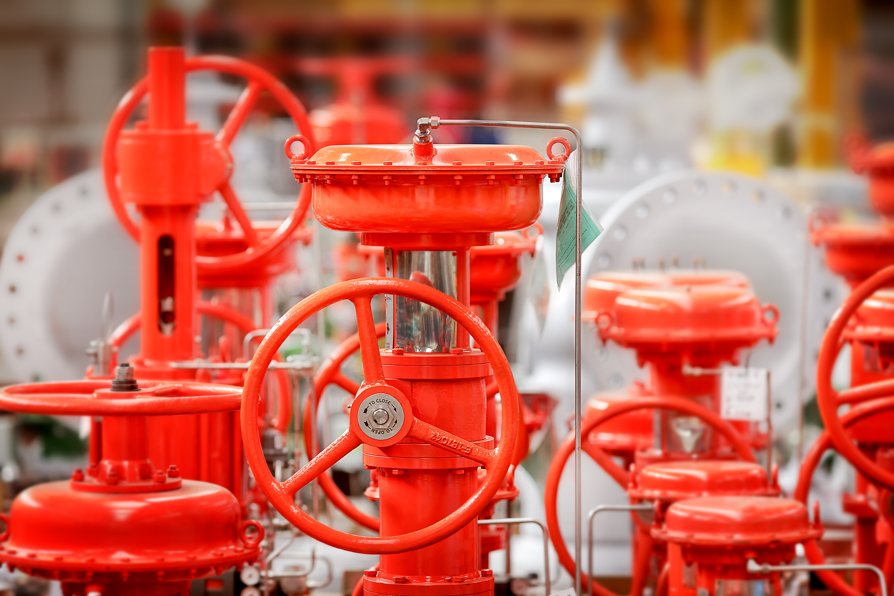 Industrial photograph of orange flow meters
