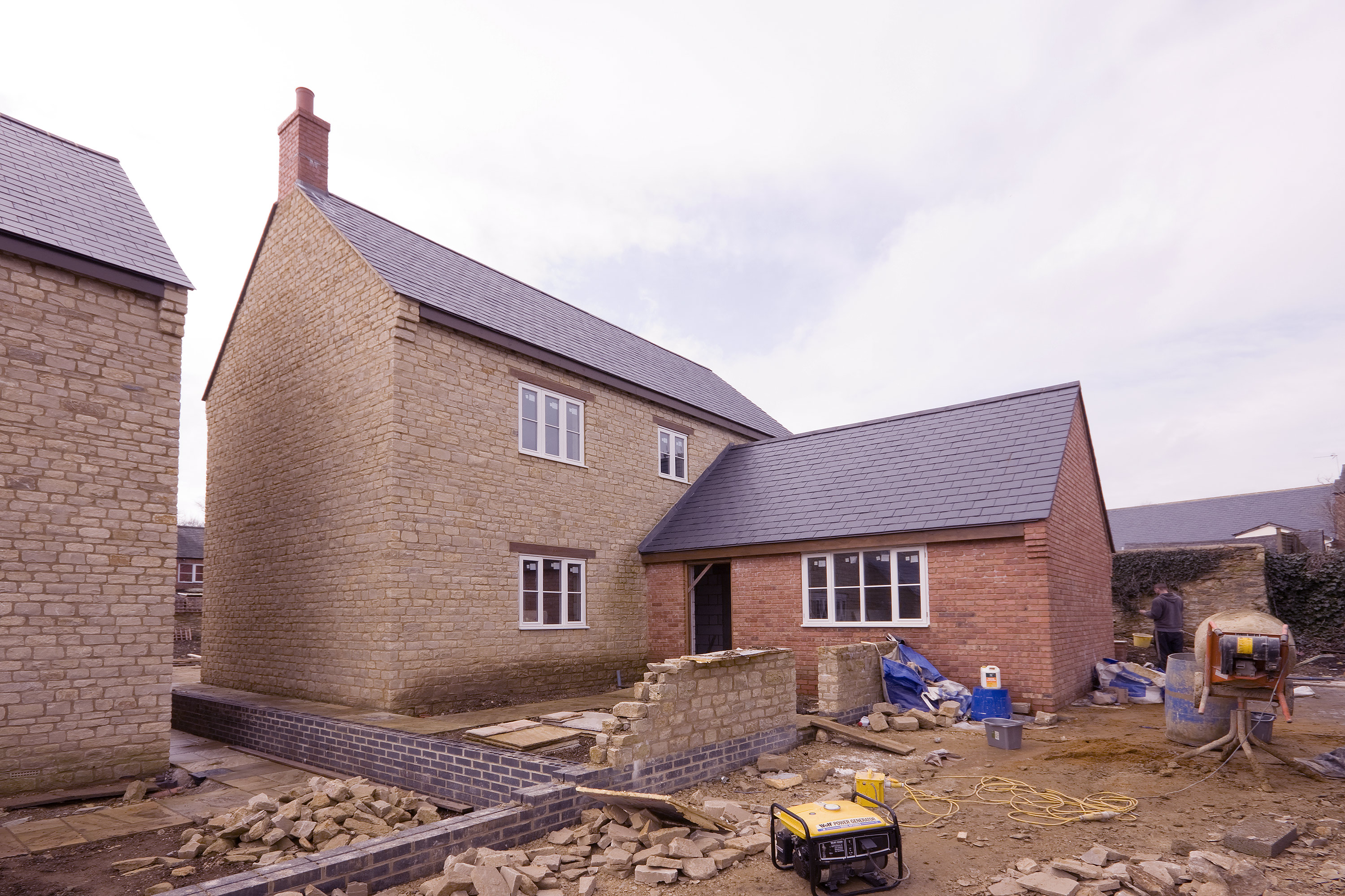 original estate Agent photograph of new building on building site