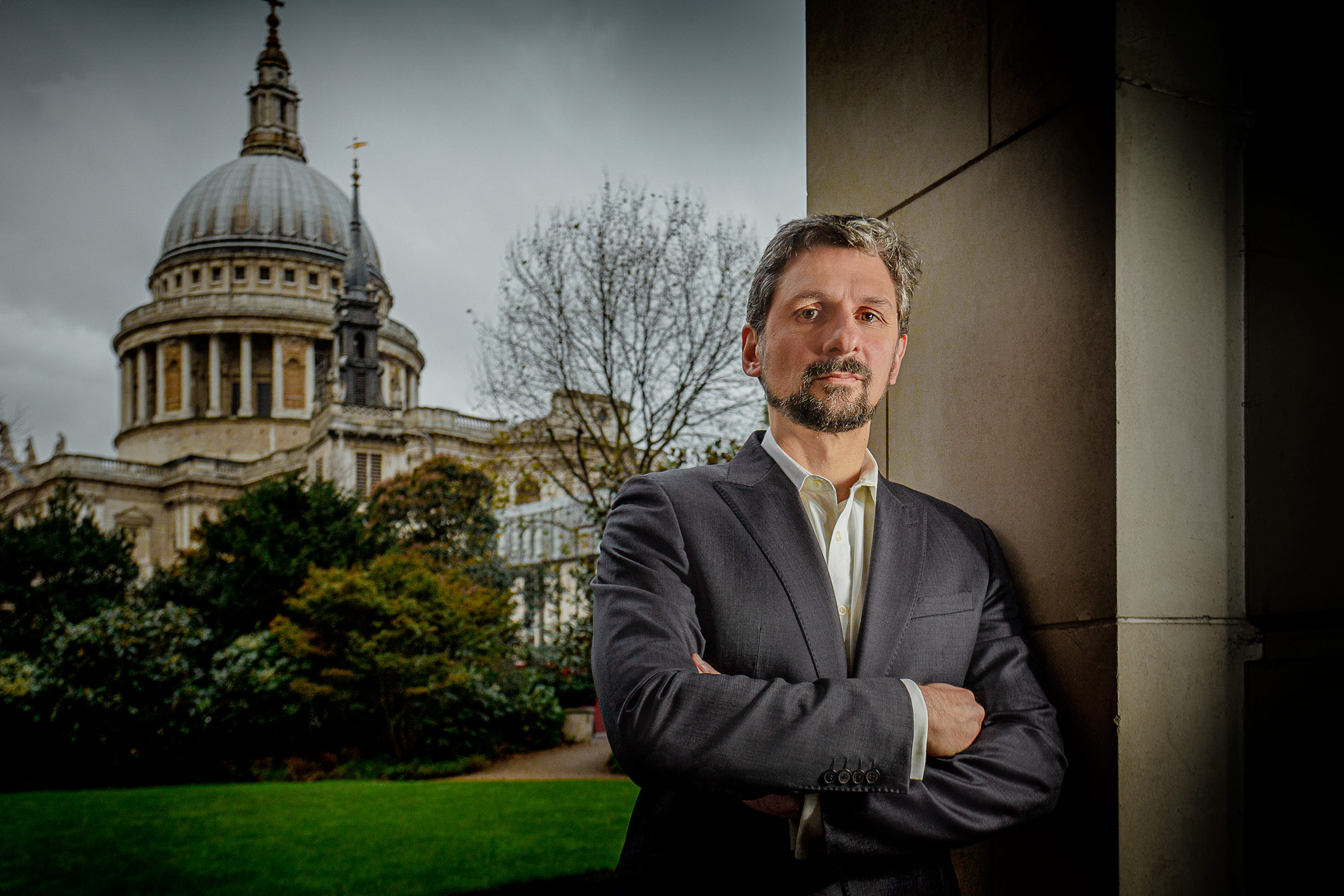 Portrait of businessman in architectural setting, St Pauls London