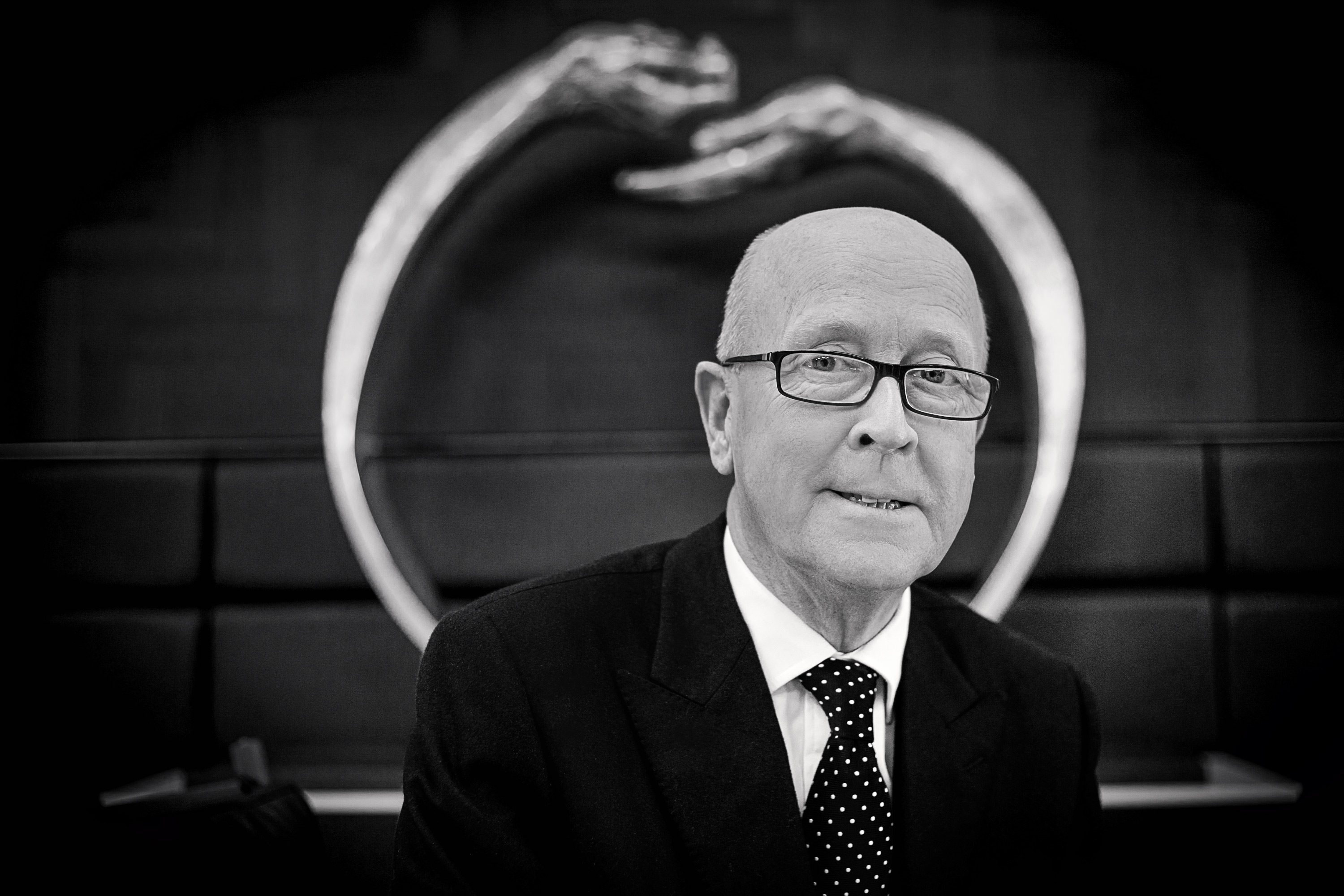Black and white portrait of businessman wearing suit