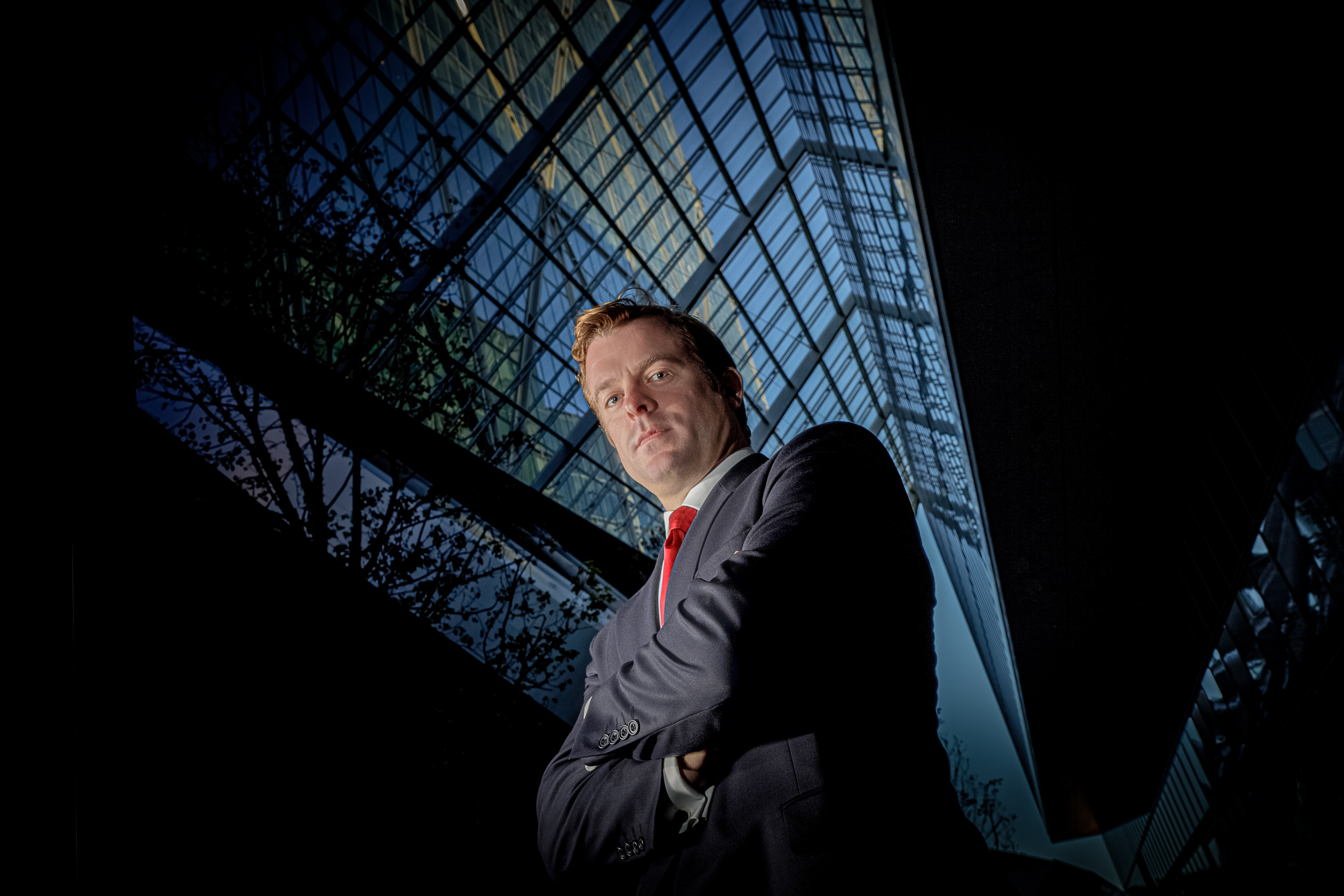 Panto Group on Stage Low-angle photography of a man under a vaulted glass ceiling
