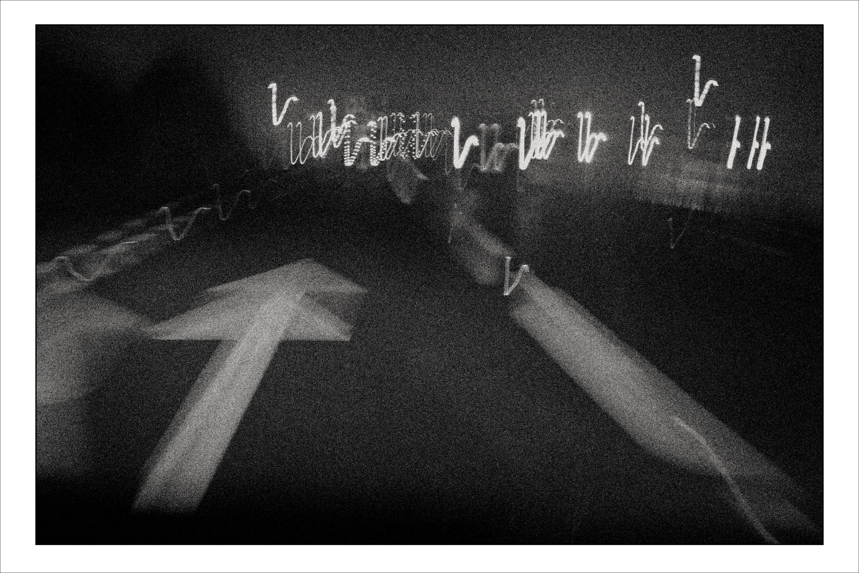 Blury black and white photograph of M1 motorway